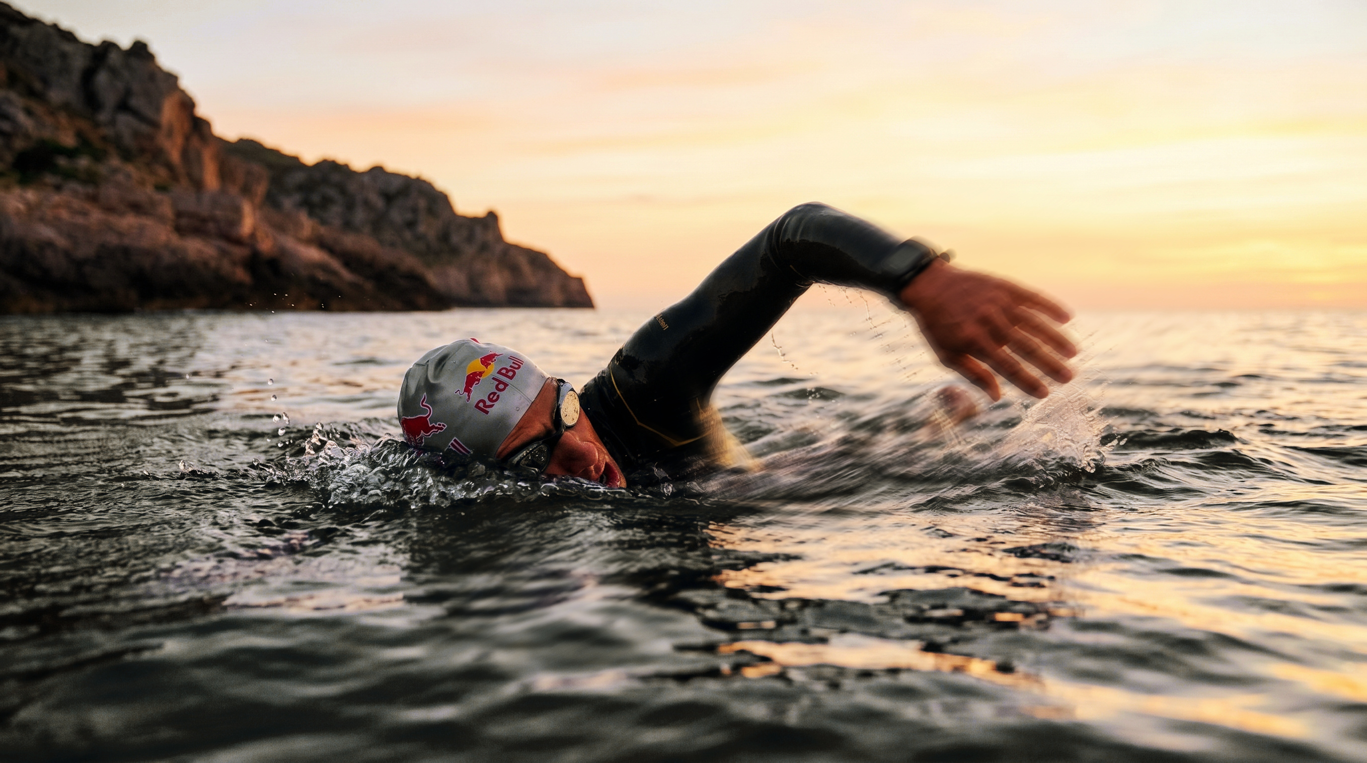 Triathletes swimming in open water competition